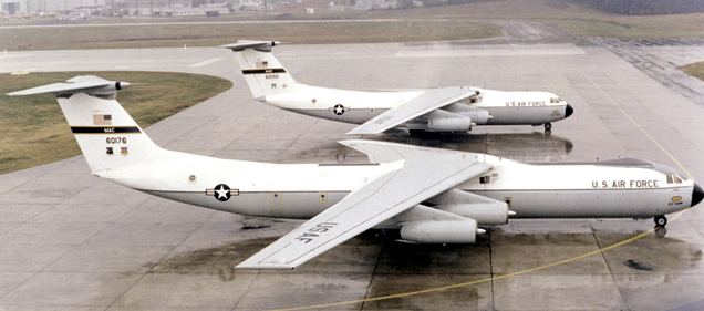 A stretched C-141B in the foreground, with an early C-141A in the background